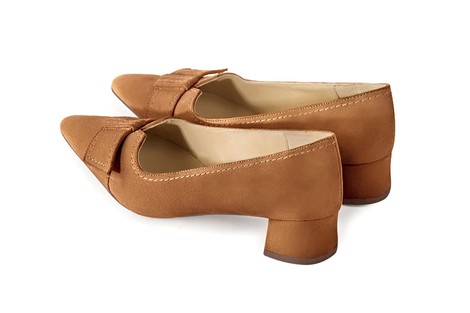 French elegance and refinement for these camel beige dress pumps, with a knot on the front, 
                available in many subtle leather and colour combinations. Possibility to customize with your colors and materials.
With its original cutout, this pretty fitted pump
will render you great services, combining comfort and distinction. 
                Matching clutches for parties, ceremonies and weddings.   
                You can customize these shoes to perfectly match your tastes or needs, and have a unique model.  
                Choice of leathers, colours, knots and heels. 
                Wide range of materials and shades carefully chosen.  
                Rich collection of flat, low, mid and high heels.  
                Small and large shoe sizes - Florence KOOIJMAN